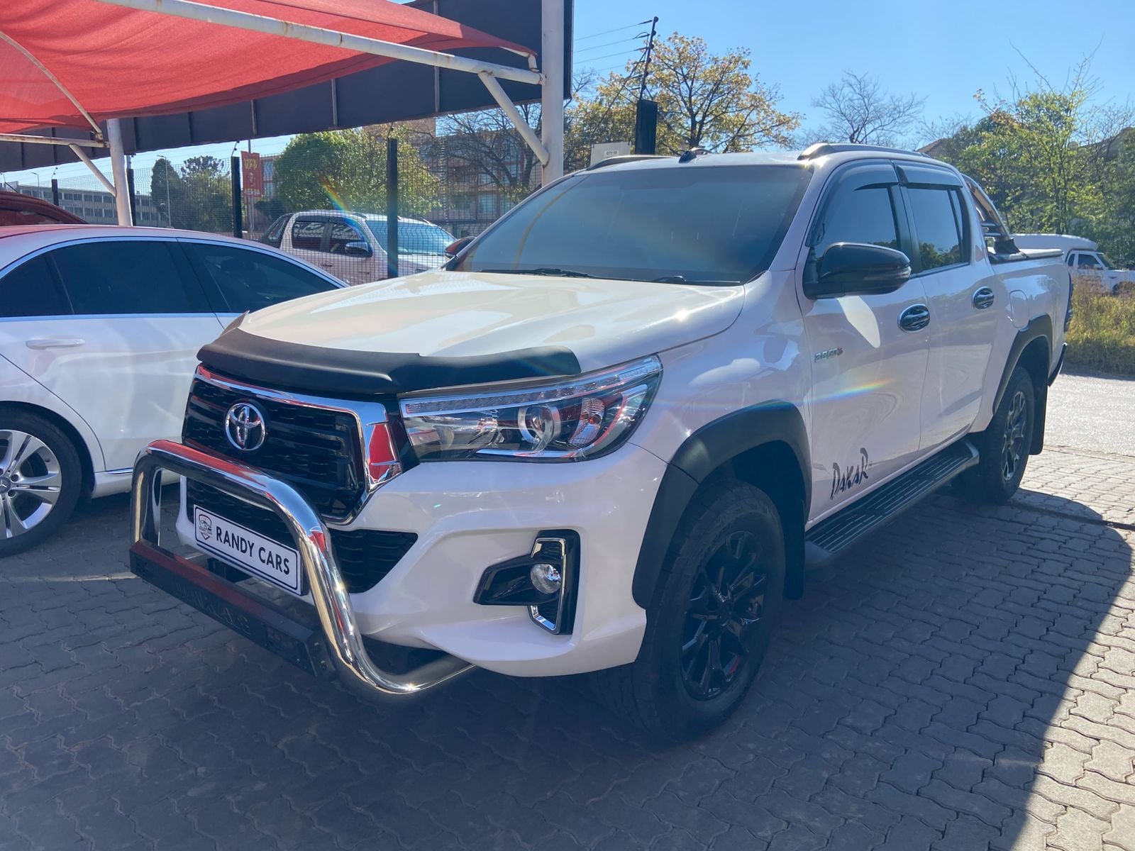 
								Toyota Hilux 2.8GD-6 Double Cab Raider Dakar Auto,Leather interior,Aircon,Radio etc amazing discounts on cash deals! free delivery guaranteed around gauteng province only. we also arrange finance through all major banks. we give 24hrs turn around period for finance applicants and same time delivery on cash deals. contact our sales team. or visit our dealership RANDY CARS AT 541 LOUIS BOTHA AVENUE SAVOY ESTATE full									