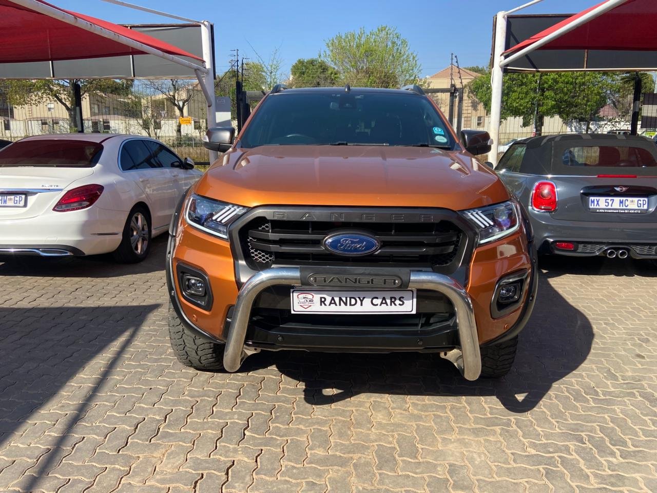 
								Ford Ranger 3.2TDCi Double Cab 4×4 Wildtrak Auto,Leather & Cloth  interior,Aircon,Radio,Reverse Camera etc amazing discounts on cash deals! free delivery guaranteed around gauteng province only. we also arrange finance through all major banks. we give 24hrs turn around period for finance applicants and same time delivery on cash deals. contact our sales team. or visit our dealership RANDY CARS AT 541 LOUIS BOTHA AVENUE SAVOY ESTATE full									
