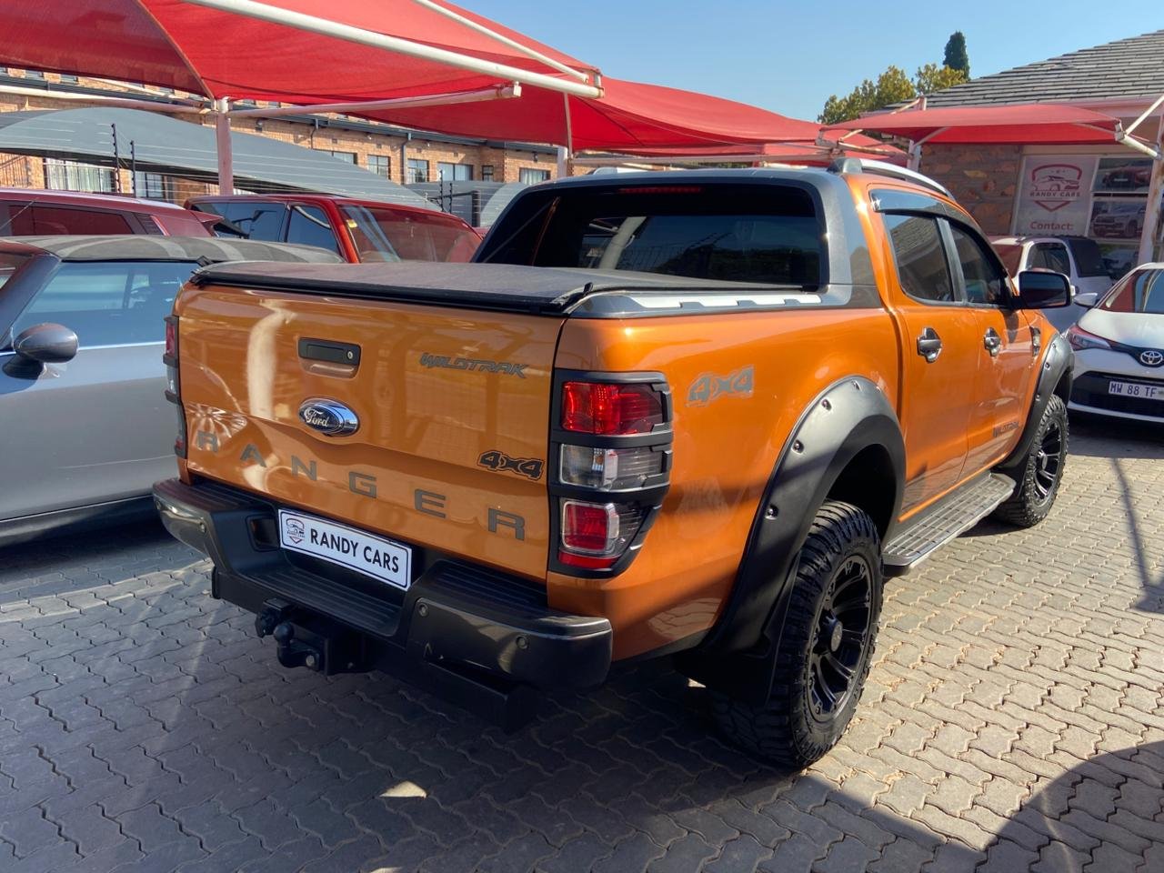 
								Ford Ranger 3.2TDCi Double Cab 4×4 Wildtrak Auto,Leather & Cloth  interior,Aircon,Radio,Reverse Camera etc amazing discounts on cash deals! free delivery guaranteed around gauteng province only. we also arrange finance through all major banks. we give 24hrs turn around period for finance applicants and same time delivery on cash deals. contact our sales team. or visit our dealership RANDY CARS AT 541 LOUIS BOTHA AVENUE SAVOY ESTATE full									