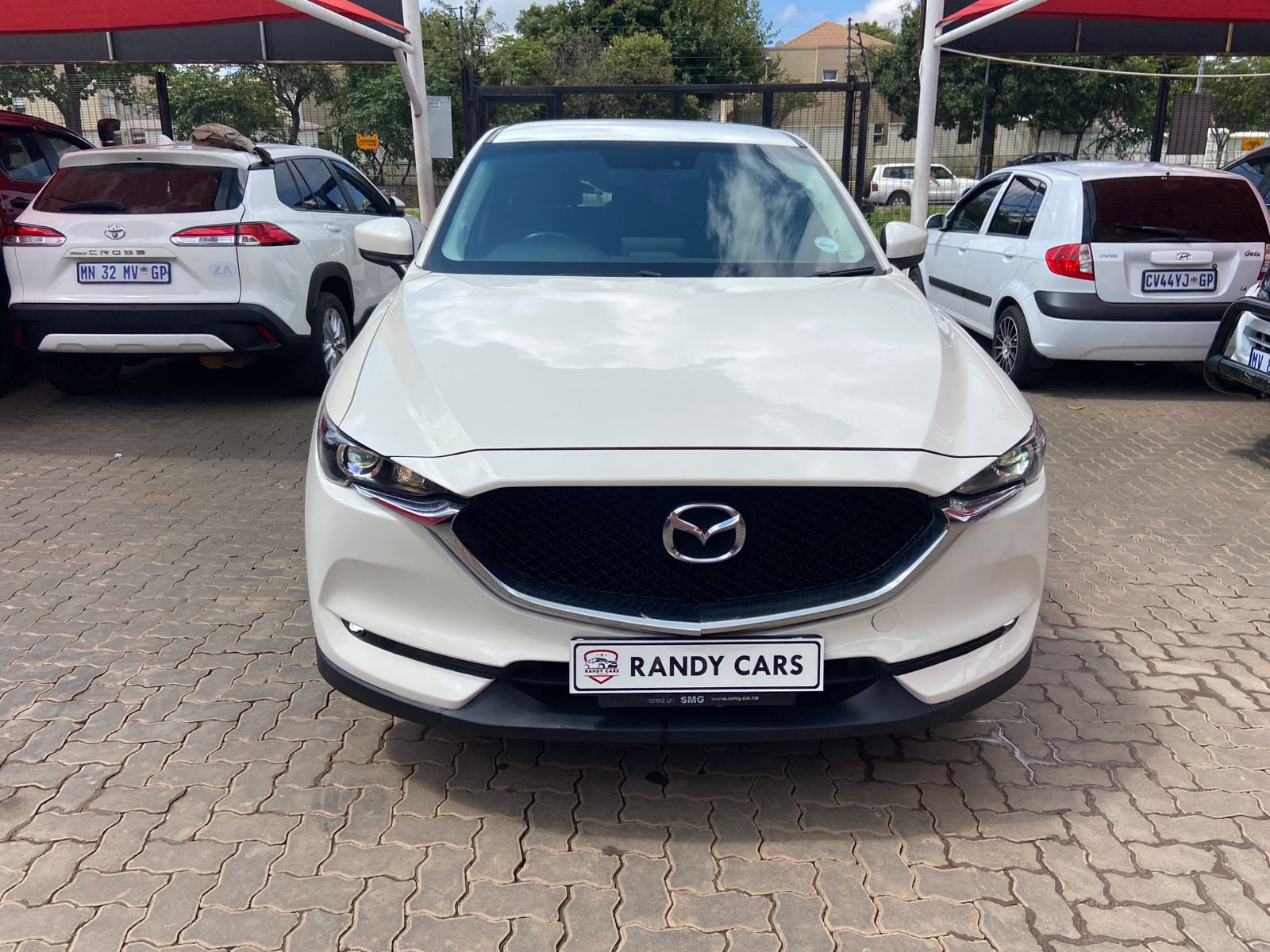 
								2021 Mazda CX-5 Active 2.0 Auto,Leather interior,electric windows,aircon etc… we give amazing discounts on cash deals! free delivery guaranteed around gauteng province only. we also arrange finance through all major banks. we give 24hrs turn around period for finance applicants and same time delivery on cash deals. contact our sales team ZANDI….. full									