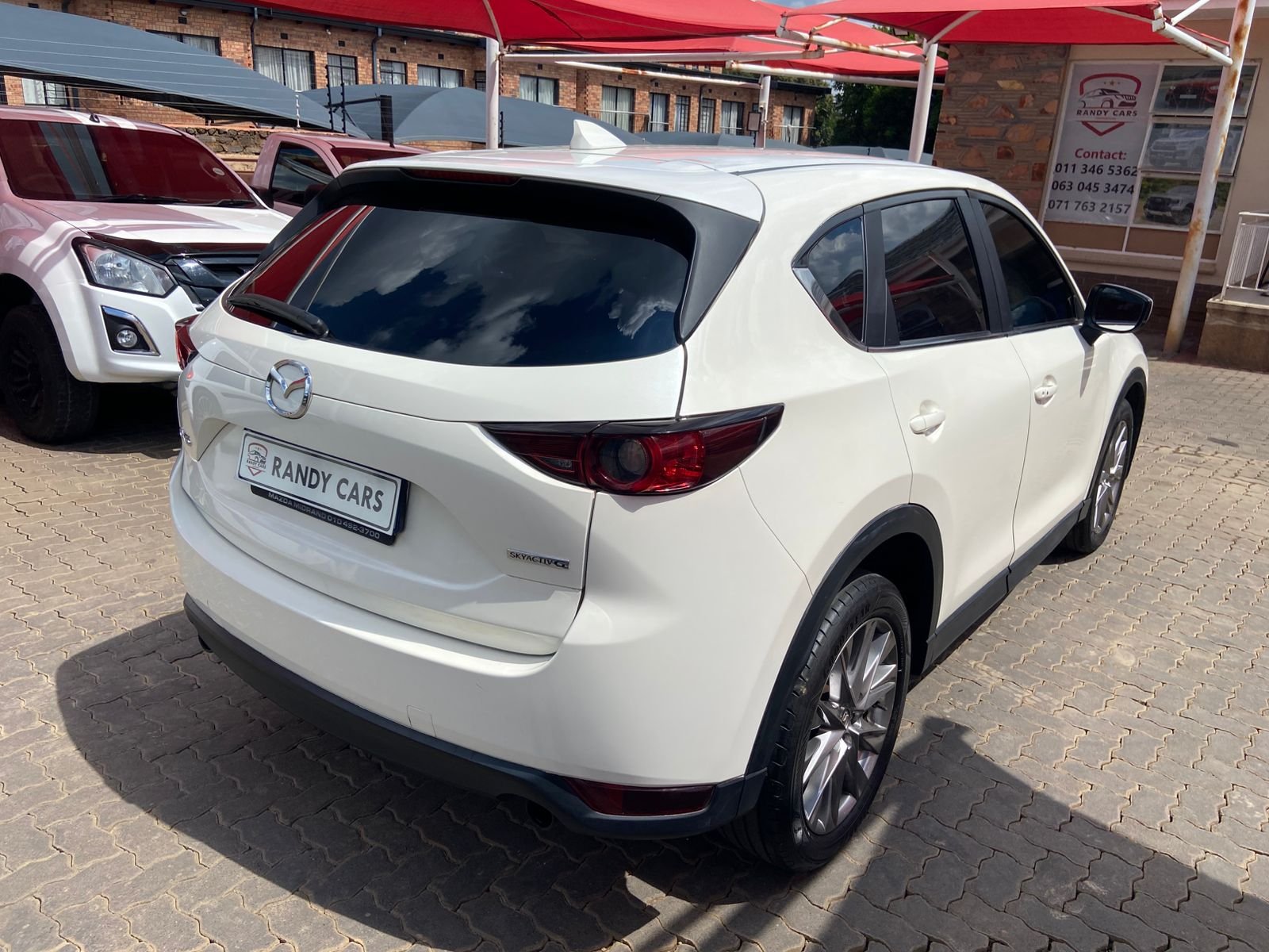 
								2021 Mazda CX-5 Active 2.0 Auto,Leather interior,electric windows,aircon etc… we give amazing discounts on cash deals! free delivery guaranteed around gauteng province only. we also arrange finance through all major banks. we give 24hrs turn around period for finance applicants and same time delivery on cash deals. contact our sales team ZANDI….. full									