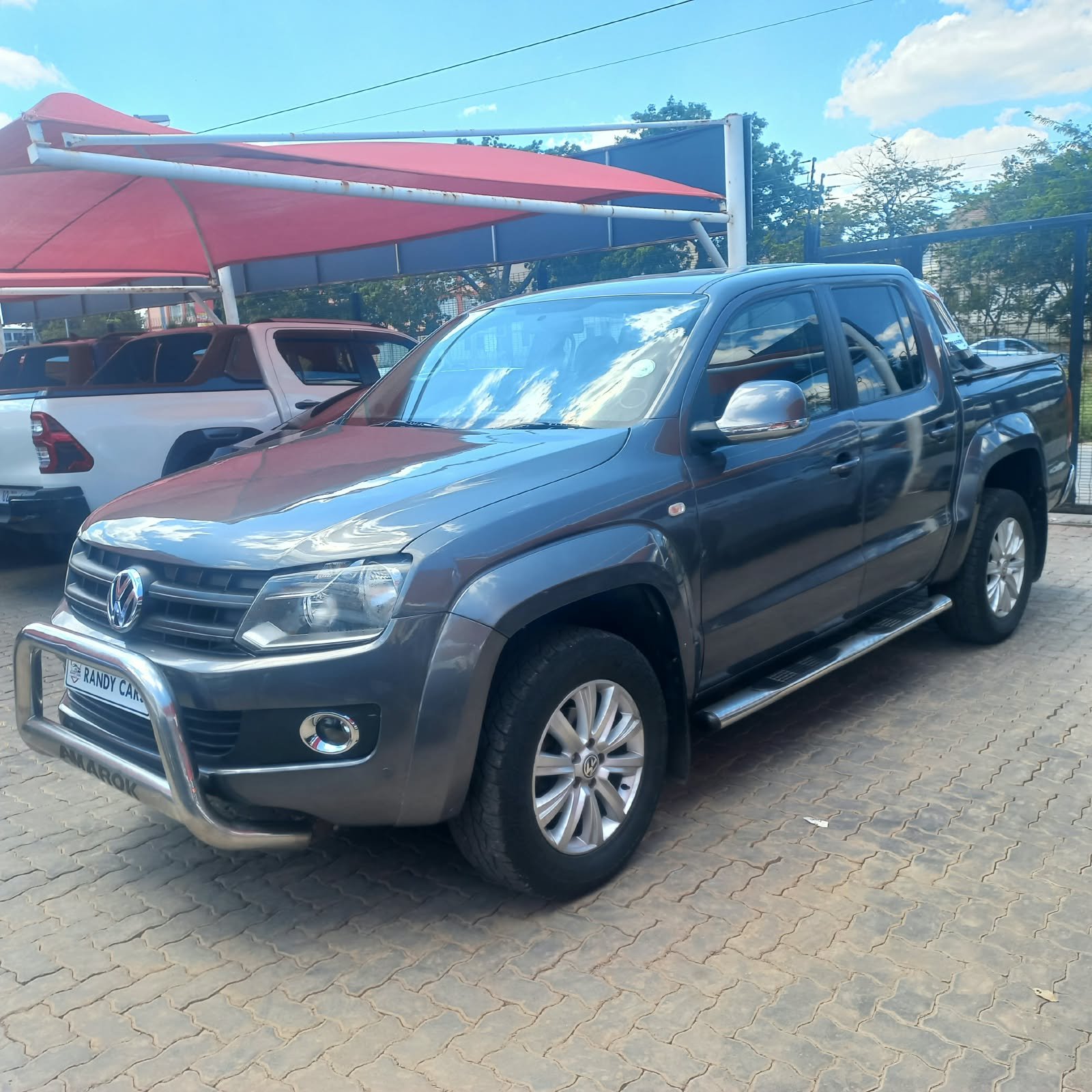 
								Volkswagen Amarok 2.0TDI Double Cab ,Leather interior,Aircon ,Electric windows etc amazing discounts on cash deals! free delivery guaranteed around gauteng province only. we also arrange finance through all major banks. we give 24hrs turn around period for finance applicants and same time delivery on cash deals. contact our sales team. or visit our dealership RANDY CARS AT 541 LOUIS BOTHA AVENUE SAVOY ESTATE JHB full									