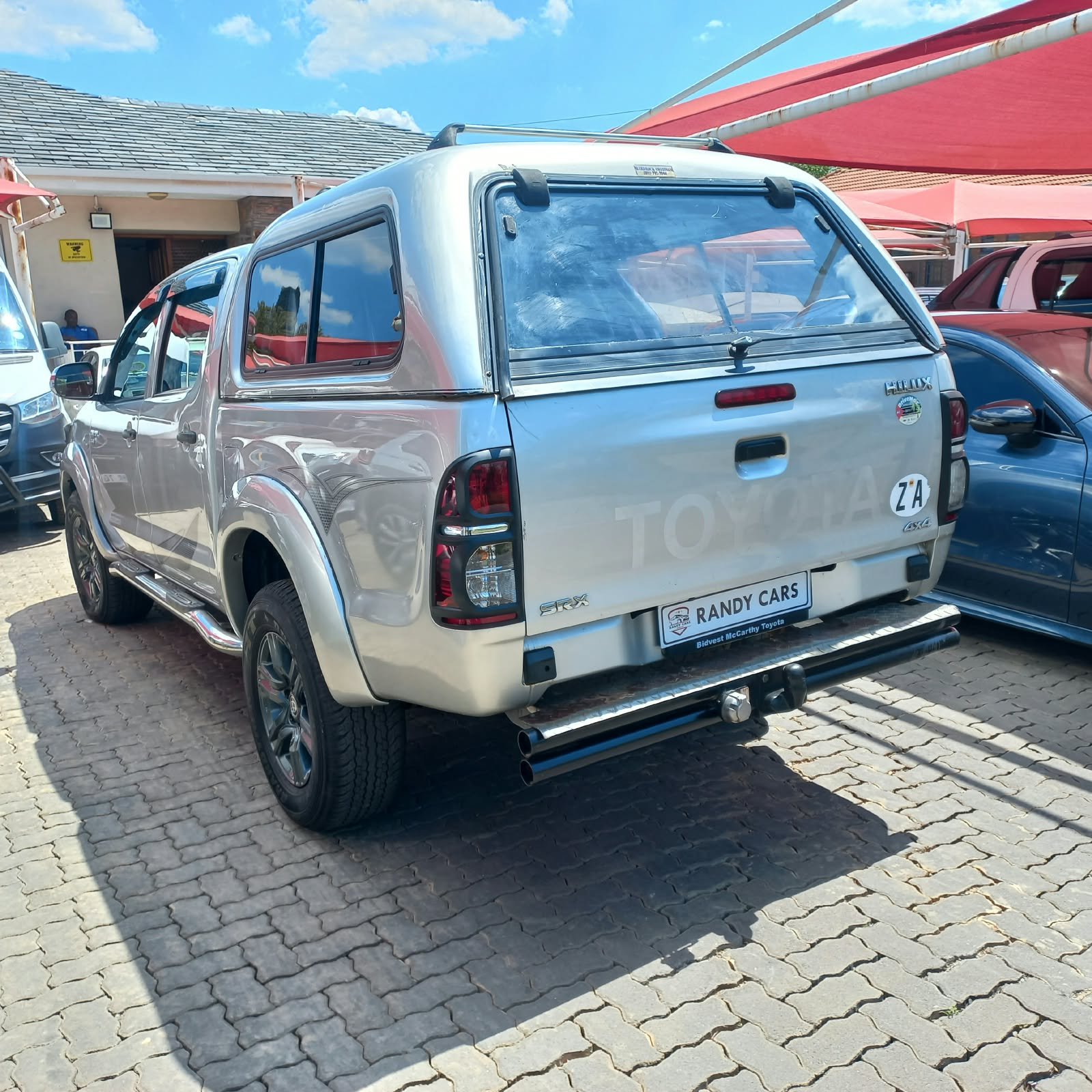 
								Toyota Hilux 2.5D-4D double cab 4×4 Raider,Leather interior,Aircon,Radio etc amazing discounts on cash deals! free delivery guaranteed around gauteng province only. we also arrange finance through all major banks. we give 24hrs turn around period for finance applicants and same time delivery on cash deals. contact our sales team. or visit our dealership RANDY CARS AT 541 LOUIS BOTHA AVENUE SAVOY ESTATE full									