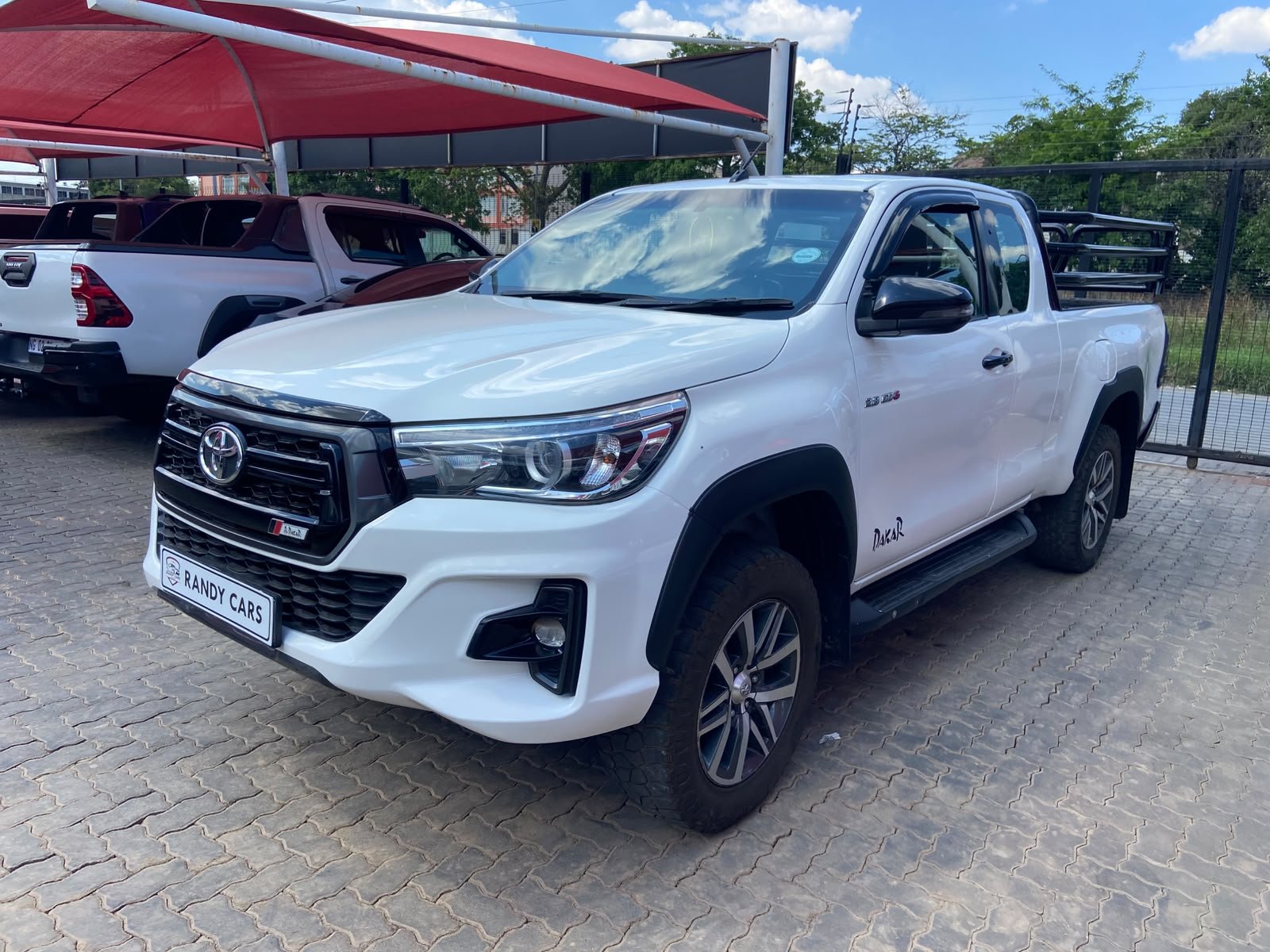 
								Toyota Hilux 2.8GD-6 Extra-Cab 4×4  Auto,Leather interior,Electric windows etc amazing discounts on cash deals! free delivery guaranteed around gauteng province only. we also arrange finance through all major banks. we give 24hrs turn around period for finance applicants and same time delivery on cash deals. contact our sales team. or visit our dealership RANDY CARS AT 541 LOUIS BOTHA AVENUE SAVOY ESTATE JHB full									